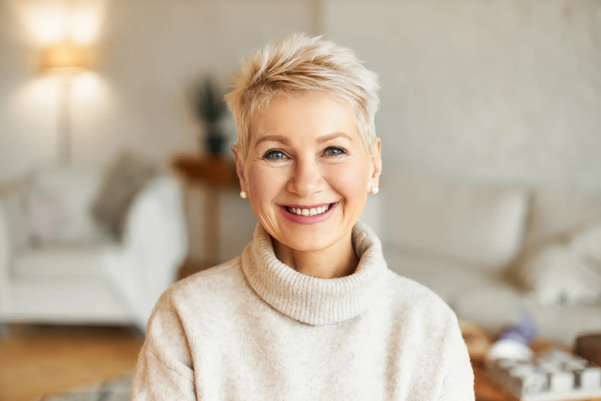 Smiling woman representing the benefits of preventive dental visits
